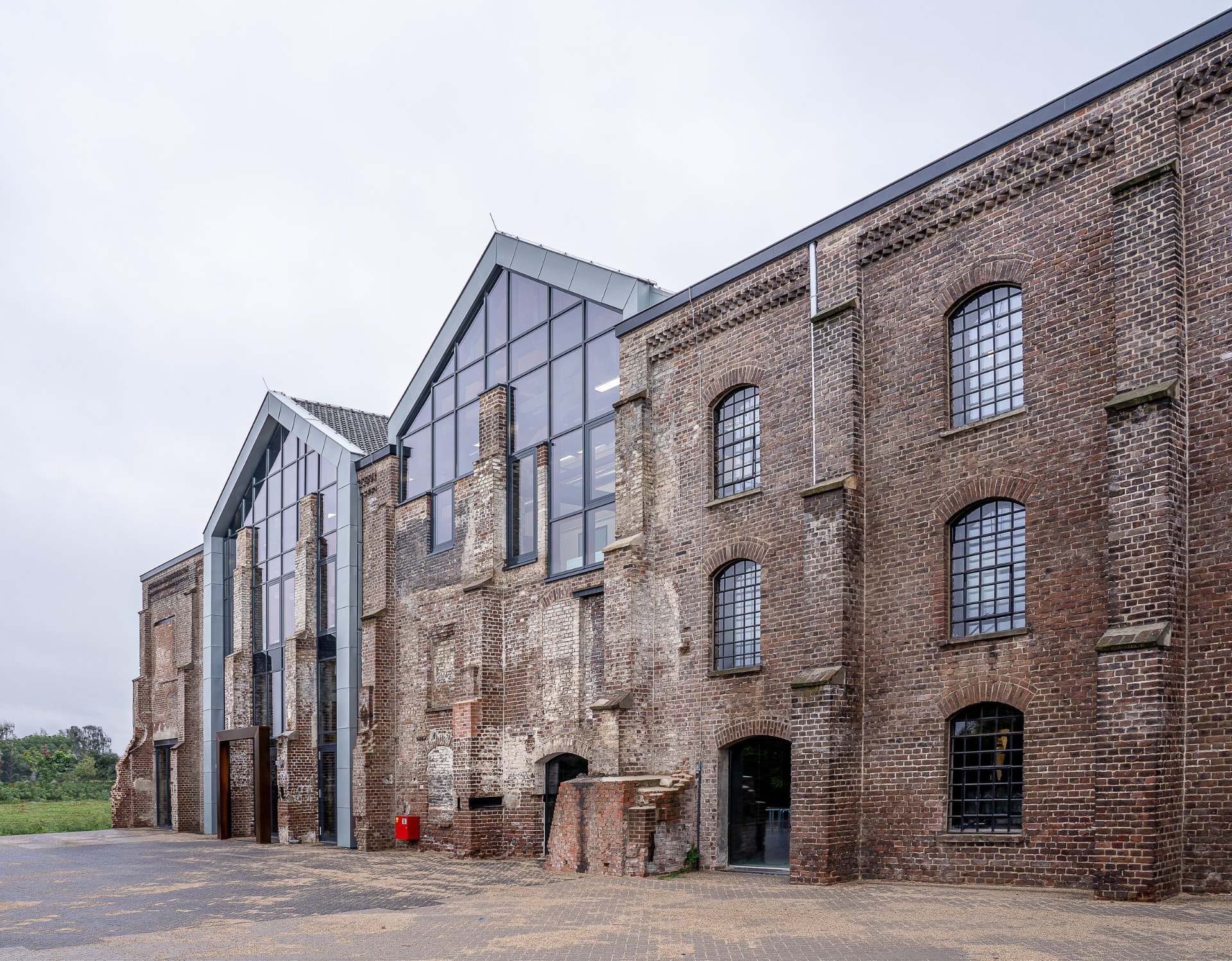 Converted Victorian brick warehouse with modern glazed extensions